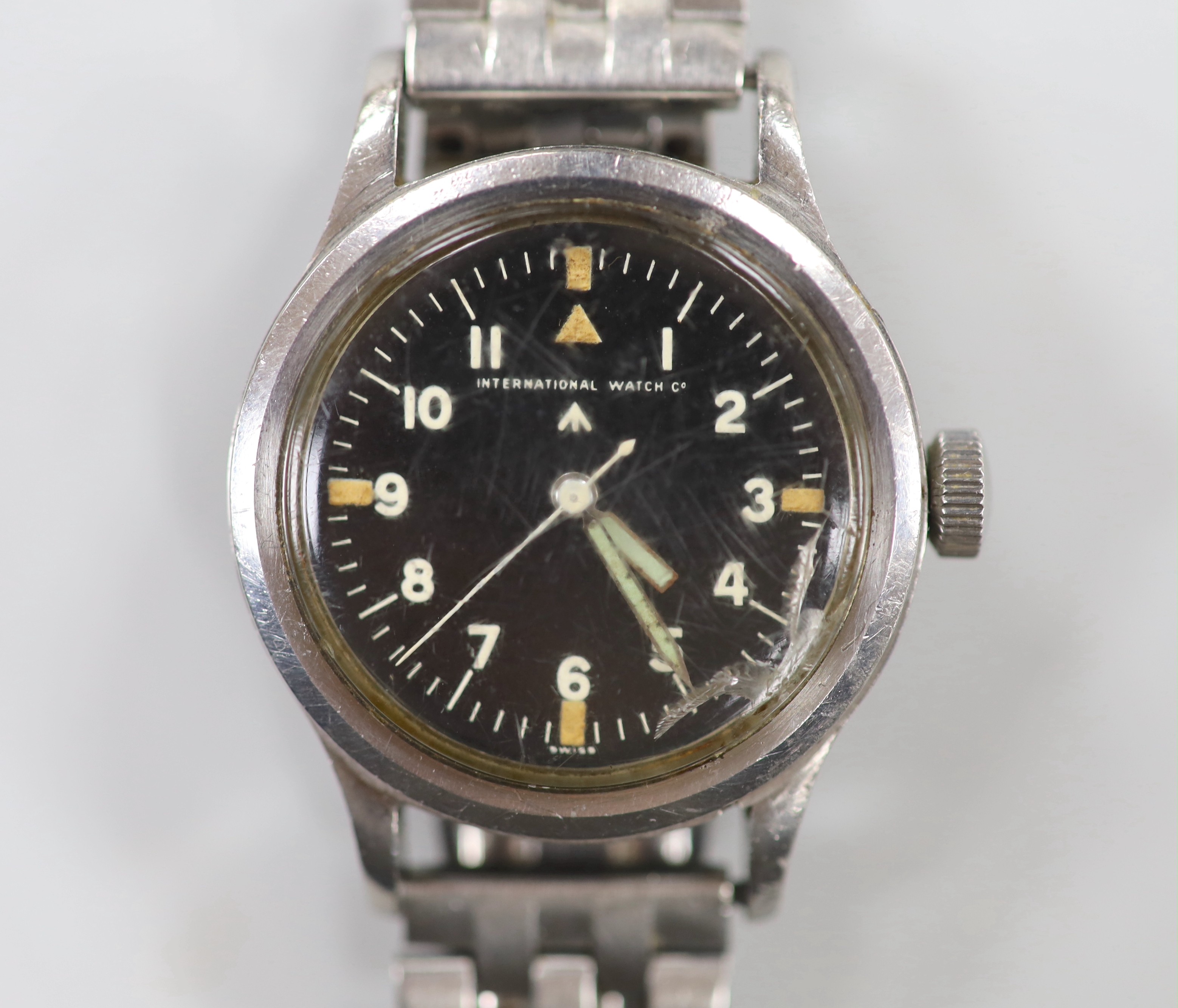 A gentleman's late 1940's steel military issue International Watch Co. manual wind black dial wrist watch, with Arabic dial with broad arrow, the case back with broad arrow and numbered 6B/346 1720/48, movement numbered